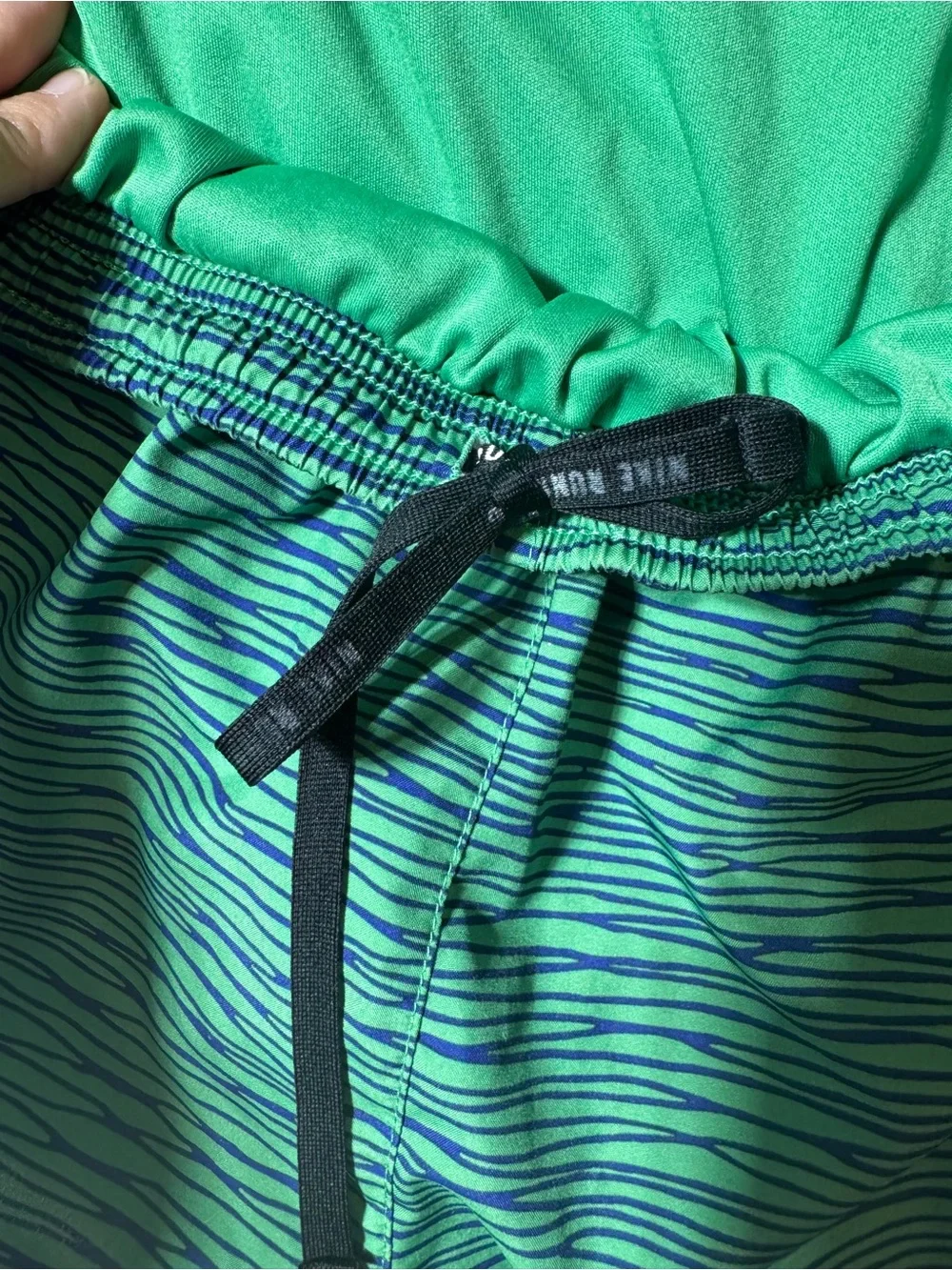 Nike Green Striped Athletic Shorts with Blue Side Panels